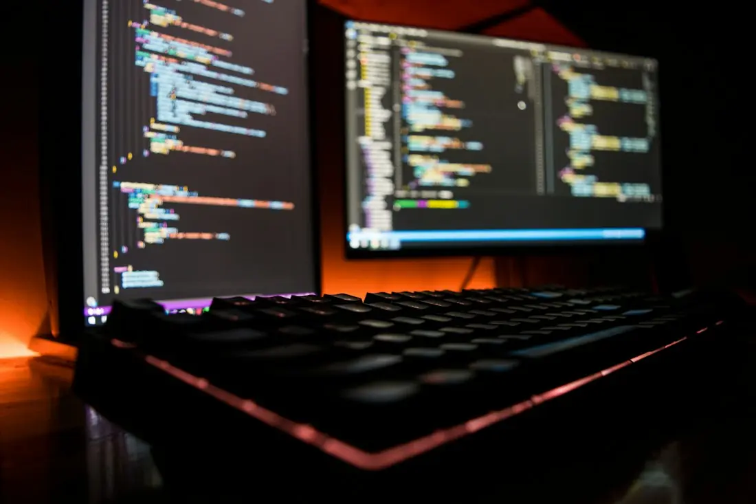 Code and test output on two monitors