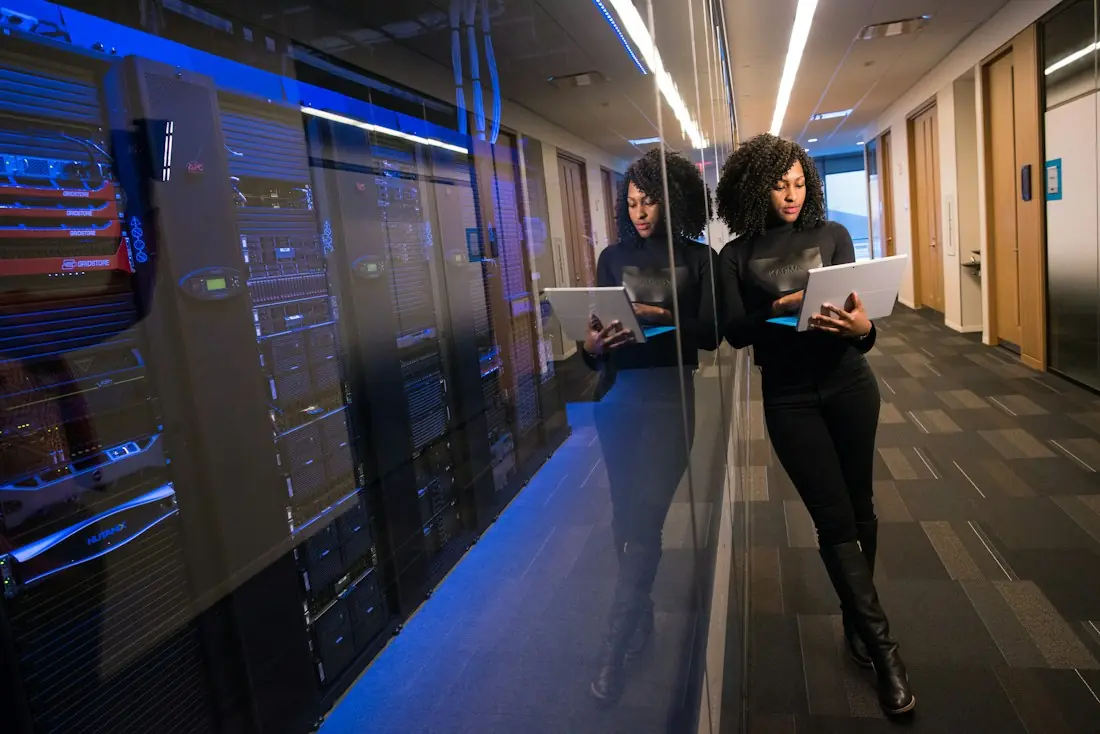 Engineers checking systems in a server room